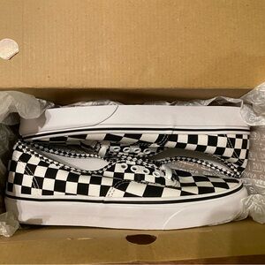 Vans Black and White Checkerboard Slip-Ons